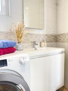Appartements Le Grand 117 - Climatisation - Wifi - Parking proche : photos des chambres