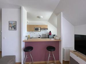 Appartements L'air marin Apt avec belle terrasse vue degagee sejour lumineux 10 mn a pied mer et centre Port en Bessin, tous commerces et restaurants, proche Bayeux et Omaha Beach : photos des chambres
