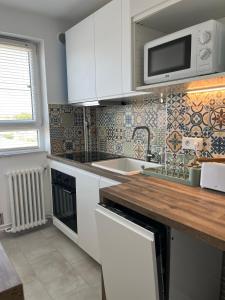Appartements Superbe apart proche transports : photos des chambres