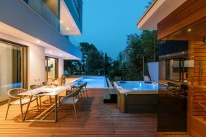 The Q Senses - new luxury apartment with piano, pool, sauna and jacuzzi 