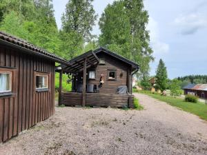 Gemütliche Blockhütte für Auszeit in Torsby auf einem Bauernhof