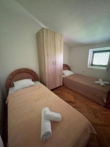 Attic Two-Bedroom Apartment with Balcony and Sea View room in Apartments Katarina