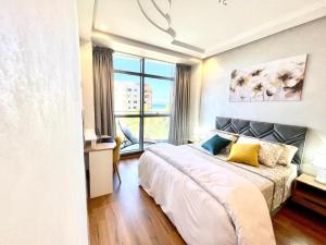 Modern elegance with Sea Views in Central Tangier - Steps to Beach, train and attractions!
