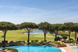 Suite with Balcony room in Onyria Quinta da Marinha Hotel