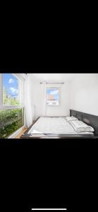 Appartements Appartement duplex en residence familiale et surveillee de 2 chambres a deux pas de paris avec sa place de parking et son jardinet Pas de fetes : photos des chambres