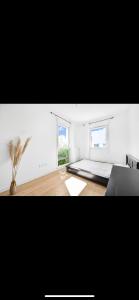 Appartements Appartement duplex en residence familiale et surveillee de 2 chambres a deux pas de paris avec sa place de parking et son jardinet Pas de fetes : photos des chambres