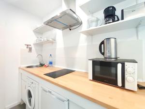 TQ8 303 Beach By Wave Properties