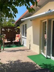 Zonneschijn, bungalow op vakantiepark bij zee - Driewegen