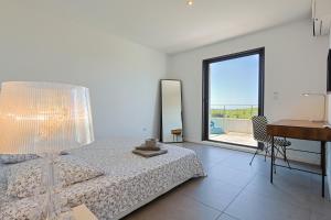 Villas Villa Contemporaine vue mer-vignobles,Piscine-Spa : photos des chambres