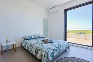 Villas Villa Contemporaine vue mer-vignobles,Piscine-Spa : photos des chambres