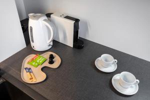 ALURE RESIDENCES 10 - 24h self check-in & private parking next to the apartment building included, CITY CENTER right on SNP Square in a quiet passage, new building, best deal in town