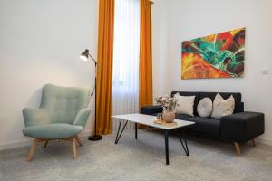 ALURE RESIDENCES 10 - 24h self check-in & private parking next to the apartment building included, CITY CENTER right on SNP Square in a quiet passage, new building, best deal in town