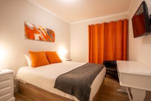 EnSuite 3 Laranja Frente Rochedo