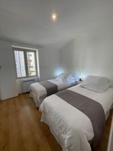 Appartements Nouveau- Maison de ville avec spa : photos des chambres