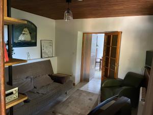 Maisons de vacances La petite maison dans le jardin : photos des chambres