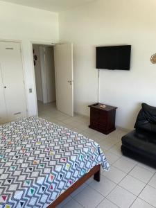 Apartamento 4 quartos de frente para o mar, Pitangueiras Guarujá