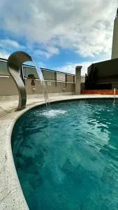 Flat Cosmopolitan PRAIA com Estacionamento Grátis - Gonzaga - Andar Alto - 伊塔尼亚恩