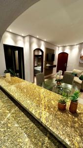 Cosmopolitan PRAIA Flat com Estacionamento Incluso - Gonzaga - Ap 76