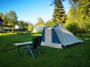 Cosy tent in garden of Swedish landhouse