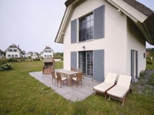 Reetland am Meer - Premium Reetdachvilla mit 2 Schlafzimmern, Sauna und Kamin E25
