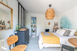 Maisons de vacances Maison typique avec jardin, proche Pont de pierre : photos des chambres