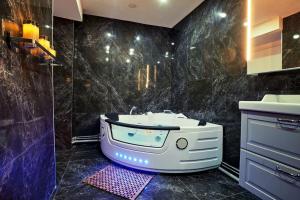 Appartements Versailles Jacuzzi - Sauna - RDC 2 : photos des chambres
