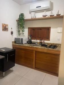 Loft próximo a Praia do Forte com piscina