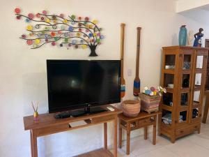 Loft próximo a Praia do Forte com piscina