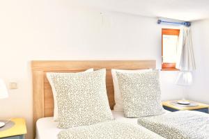 Appartements La Legende des 2 Pierres : photos des chambres