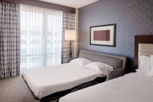 Deluxe Queen Room with Two Queen Beds and Sofa Bed room in Hilton Garden Inn Washington DC/Georgetown Area