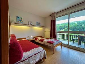 Appartements Appartement pour 8 pers. a 50m des pistes avec Wifi et Parking - FR-1-525-288 : photos des chambres