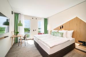 Junior Suite room in ARCOTEL HafenCity