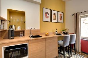 Appartements Maison Tillot : photos des chambres