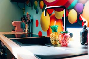Appartements Capsule Bonbon - Balneo - Sauna - Billard - Nintendo Switch : photos des chambres