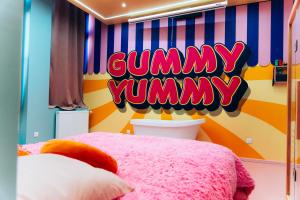 Appartements Capsule Bonbon - Balneo - Sauna - Billard - Nintendo Switch : photos des chambres