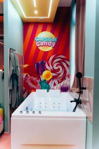 Appartements Capsule Bonbon - Balneo - Sauna - Billard - Nintendo Switch : photos des chambres