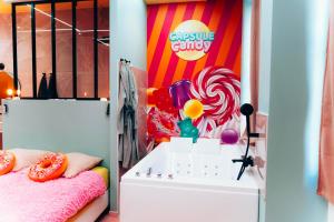 Appartements Capsule Bonbon - Balneo - Sauna - Billard - Nintendo Switch : photos des chambres