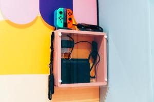 Appartements Capsule Bonbon - Balneo - Sauna - Billard - Nintendo Switch : photos des chambres