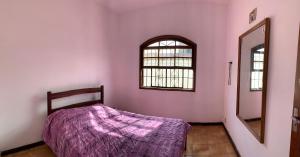 Casa agradável com estacionamento incluso