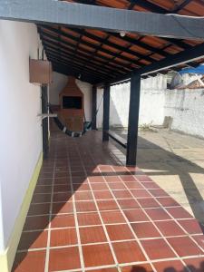 Casa agradável com estacionamento incluso