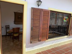 Casa agradável com estacionamento incluso