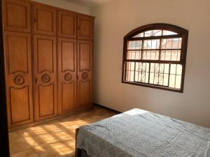 Casa agradável com estacionamento incluso