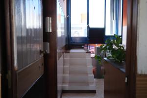 Comprensorio Olivetti - La Serra - stanza 204