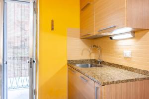 Yellow Apartment near the Train Station with Balcony