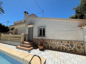 Villa con piscina a 5 min a pie de la playa y Pau5