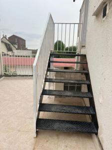 Appartements Charmante studio ligne 13 tram 5 saint denis : photos des chambres