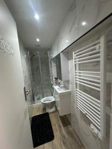 Appartements Charmante studio ligne 13 tram 5 saint denis : photos des chambres