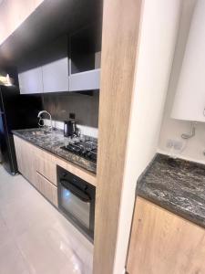 RIOJA 919 Departamento Premium - 1 Dormitorio con COCHERA