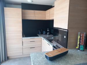 Campings Chalet dans domaine avec piscine : photos des chambres