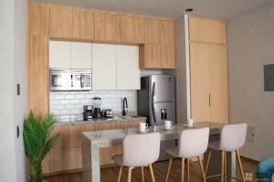 Hermoso y nuevo depto a pie de playa